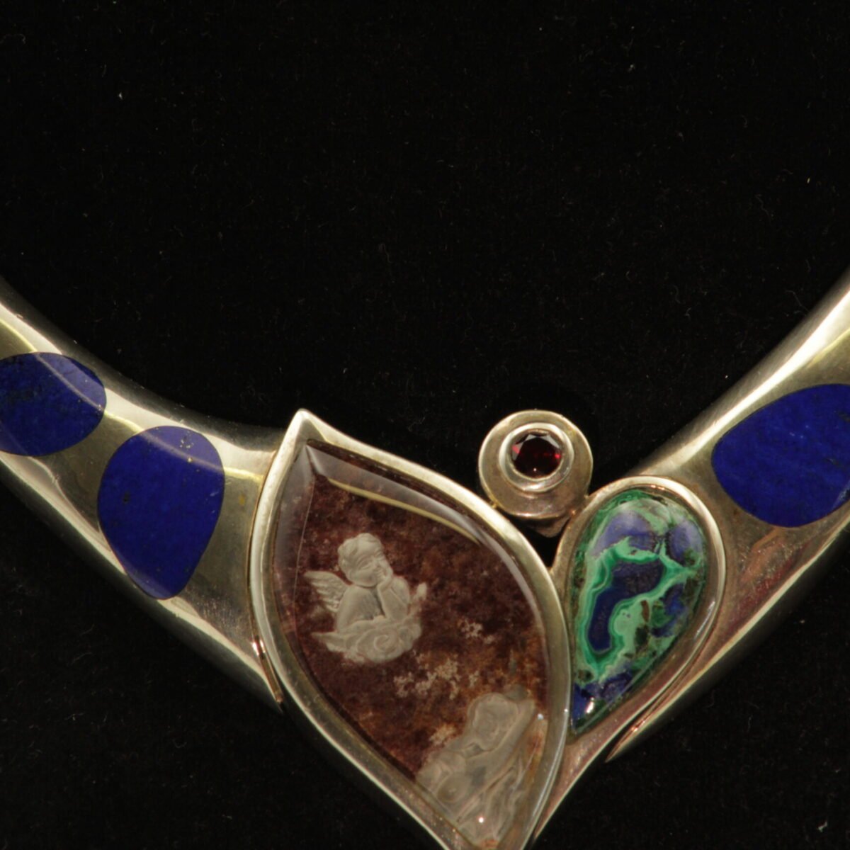 Sterling silver Cupid carved necklace