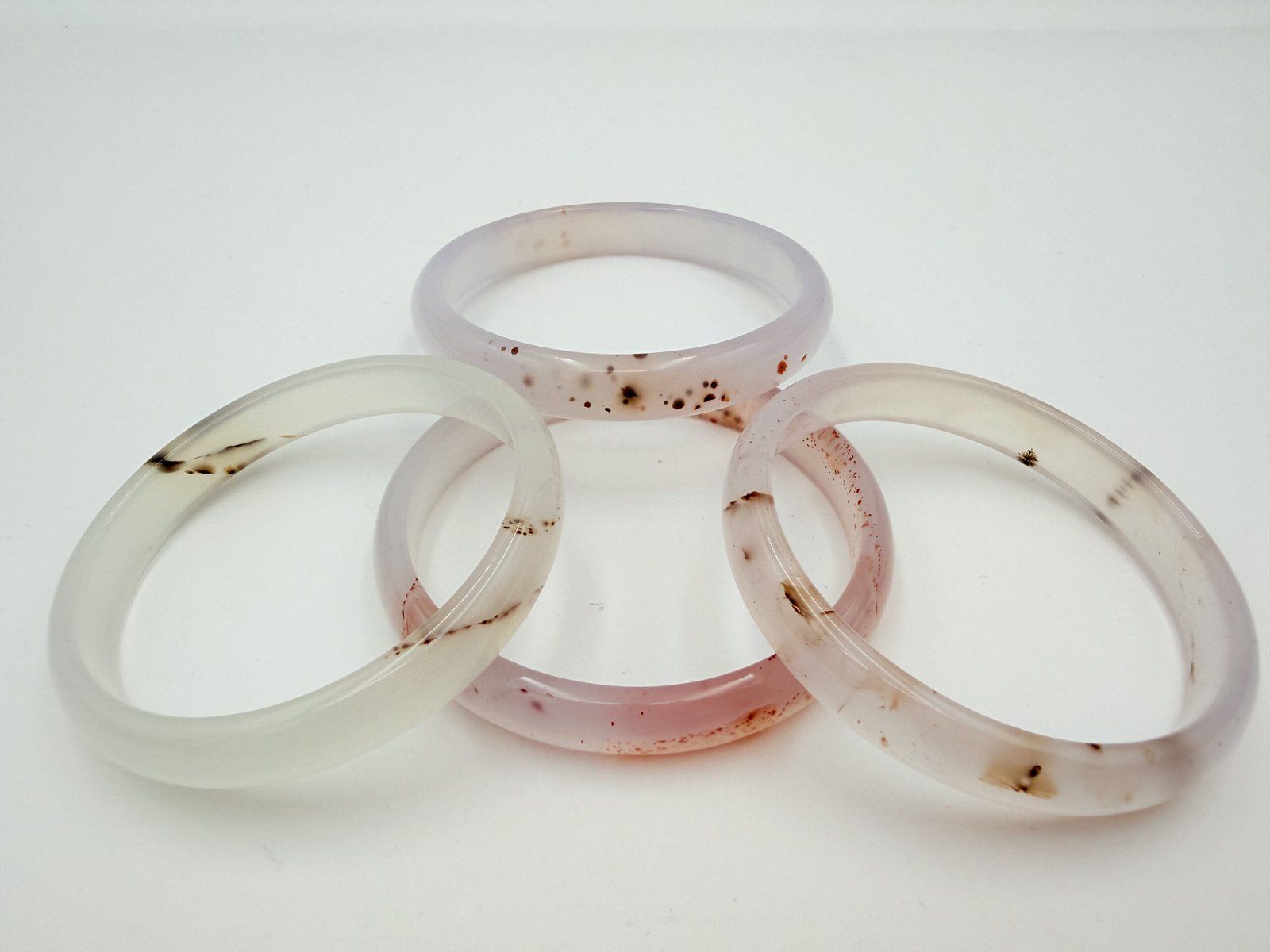 Red-Speckled Translucent White Agate Bangle - Image 4
