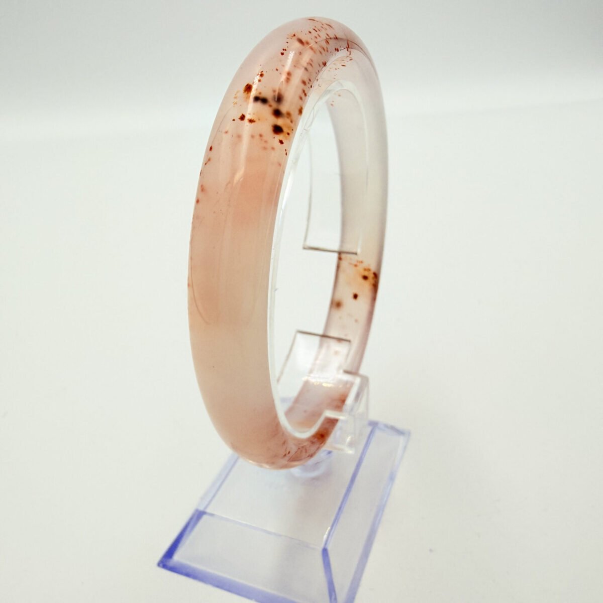 Alternative view of Red-Speckled Translucent White Agate Bangle